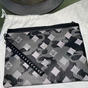 100% Authentic MCM pouch/wristlet.